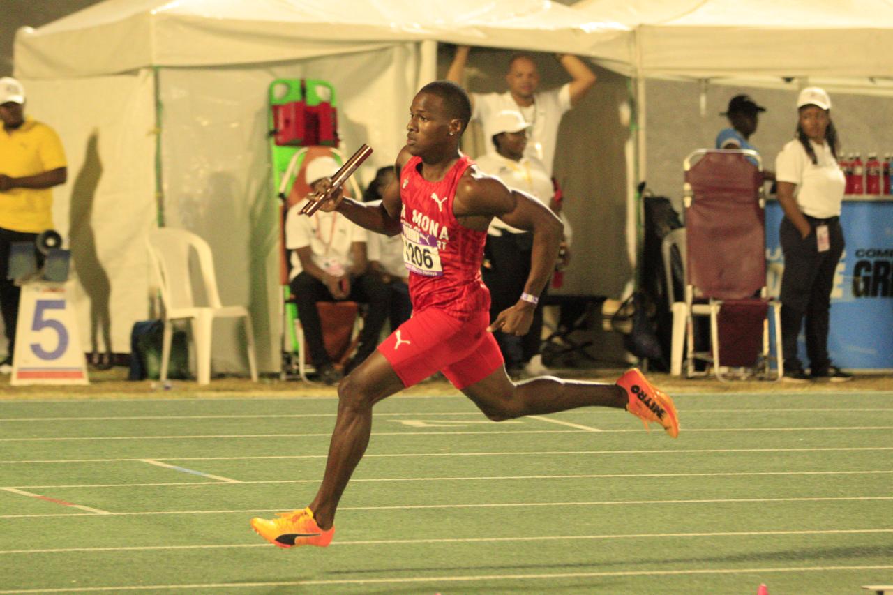 MONA athlete with relay baton